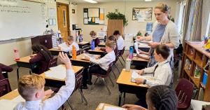 Geneva Academy teacher leads small classroom instruction at the classical Christian private school in Roseburg, Oregon