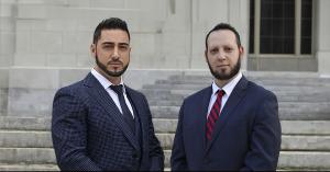 Frank DelloRusso and Geoffrey Liter, lawyers from South Florida Law PLLC standing in front of court house