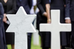 A Star of David and a Latin cross headstone at Meuse-Argonne American Cemetery. June 2, 2026, ABMC and Operation Benjamin changed five headstones at the cemetery to reflect the service members’ faith. (ABMC/NGuyen-Kim)