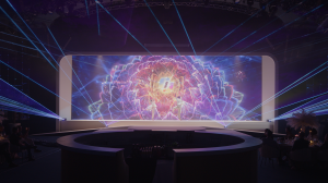 Channel Partners has been named the winner of a Bronze Award at the 2026 Eventex® Awards in the Product Launch category Two dancers in white perform in front of a wide LED screen displaying a vibrant pink and purple bloom, with blue lasers fanning outward across the venue.
