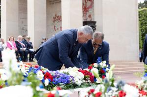 ABMC Commissioner David Bossie and Chairman Michael X. Garrett lay a wreath on behalf of ABMC June 6, 2026, during the D-Day ceremony at Normandy American Cemetery (ABMC photo/Gaudun)