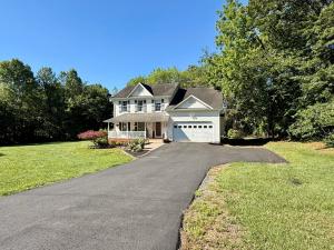 4 BR/2.5 BA home on 1.73± acres in Culpeper County, VA. This home measures 4,423± sf. and features kitchen (all appliances convey); great room w/vaulted ceilings & deck access; living room; dining room w/gas fireplace; office; attic; partially finished walk-out basement