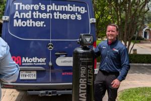Responsible Master Plumber Steven Smith arrives at Dallas home with water softener system and service van, Mother Modern Plumbing