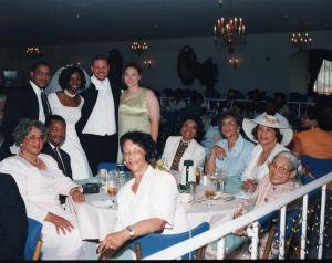 Angela Sadler Williamson is pictured with family on her wedding day. Civil rights icon Rosa Parks, a beloved member of the family, is seated at bottom right.