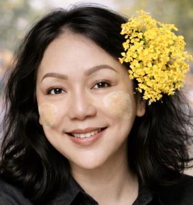 Levi Sap Nei Thang wearing Padauk flowers, celebrating Myanmar’s national flower and cultural heritage.