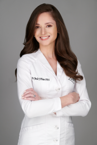 Dr. Yenile Pinto, founder of Deering Dental, a biomimetic and functional dental practice in Palmetto Bay, FL.