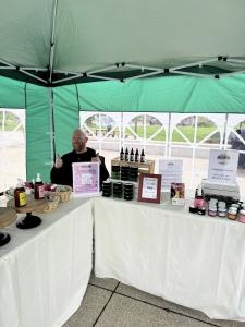 Co-Owner of Faithful Tallow Co. Alex Simmons at their Event Booth