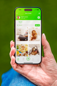 Families are capturing more photos, videos and digital memories than ever before, yet much of that content remains scattered across phones, computers, social media accounts and cloud storage services App screen image showing family photos in organised albums