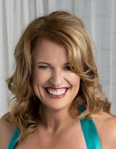 A headshot photo of Liz Holtzinger, author of Lead Yourself First