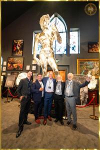 Ricky Reed, Jason Dilling, Mark Russo, Ferdinando Marinelli Jr., and Michael Sheppard standing in front of the Pure Silver David during its unveiling at Museo Michelangelo in Battle Ground, Washington.