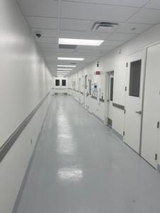 Customer-dedicated cleanrooms are accessed via a Grade D clean corridor