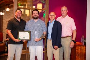 Representatives from Coastal Windows & Exteriors accept recognition as a recipient of the James Hardie Service Excellence Award, an honor that reflects dedication to quality installations, customer care, and industry-leading service throughout Massachuset