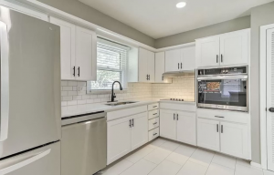 Expert cabinet refinishing and kitchen modernization services in Kansas City provided by Elite77 Painters LLC for long-term home value enhancement.