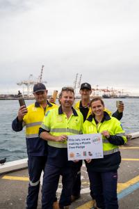 Group of people making a plastic free pledge at the Fremantle Port