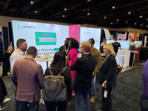 Cognota team demoing to excited audience at DevLearn
