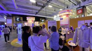 Visitors at the Holon Bionics booth during VivaTech 2026 in Paris, where Heri Farm's Inc. showcased engineered mycelium materials and sustainable material innovations.