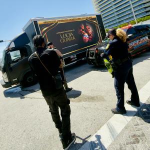 An original photograph showing the digital billboard truck during the remembrance.