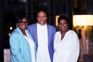 Chris Zeigler posing with community leaders at a North Texas networking event supporting collaboration and homeownership education.
