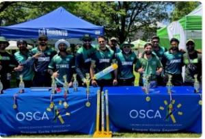 TD Crcket players celebrating with trophies behind an OSCA table at the 2026 CIMA Mayor’s Trophy in Toronto.