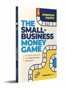 Book cover of  “The Small-Business Money Game: The Hidden Strategies That Turn Survival into Scale,” by Robinson Aquino
