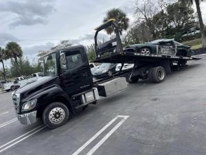AD Buys Junk Cars tow truck