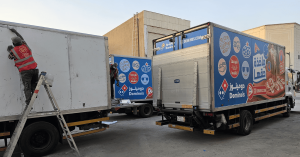 Car branding company wraps Domino's Pizza delivery truck