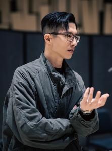 Director L.J. James Hung sharing his vision for AI-assisted filmmaking and storytelling during a panel on the future of Hong Kong cinema and creative talent development.
