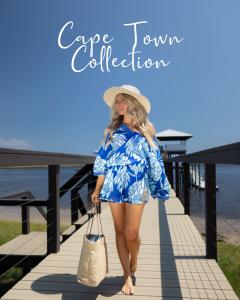 Model wearing Blue Protea print beach dress