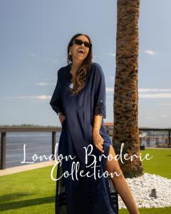 Model wearing Broderie Navy Maxi Dress