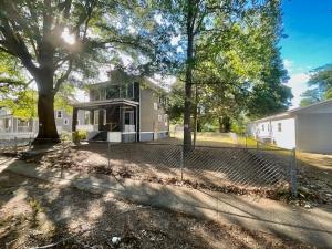 Total Rehab Project Due to Fire Damage: 4 BR/1.5 BA two-story home w/basement on large .25± acre corner city lot • This home measures 1,576± gross sf. and features an eat-in kitchen, living room, dining room, attic, unfinished basement