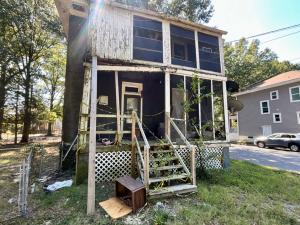 Total Rehab Project Due to Fire Damage: 4 BR/1.5 BA two-story home w/basement on large .25± acre corner city lot • This home measures 1,576± gross sf. and features an eat-in kitchen, living room, dining room, attic, unfinished basement