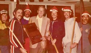 Iconic American actor John Wayne is pictured with paddlers from the Catalina Crossing outrigger canoe race in 1971.