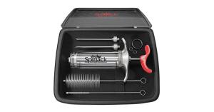 SpitJack has introduced the SQUIRT 50, a compact 50 ml meat injector designed for home cooks seeking a practical, affordable way to inject marinades, brines, broths, and other injection recipes directly into meat SpitJack SQUIRT 50 meat injector kit displayed with the injector, needles, brushes, O-rings, storage case, and launch headline.