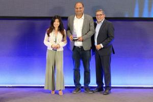 CRM Masters Infotech LLP is moving beyond CRM CRM Masters Infotech receiving the AI Enterprise Catalyst Award on stage at an industry event.