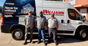Three Generac Generator Technicians standing in front of a Williams Electric Service & Generators service truck