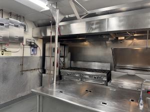 Commercial kitchen after professional deep cleaning and grease removal by CE Kitchen Cleaning
