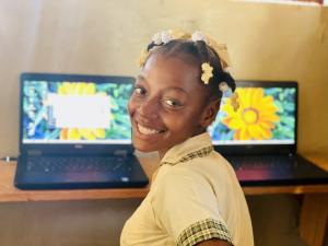 Student using computer for the first time.