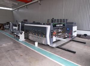 Synchronization of Corrugated Board Formation and Downstream Stacking