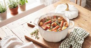 After selling out last season and prompting months of customers asking when it would return, Larder & Vine's White Pumpkin Dutch Oven is back for another fall season Larder & Vine White Pumpkin Dutch Oven filled with hearty beef stew in a farmhouse kitchen.