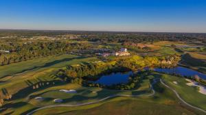 Altamira Development Company is pleased to announce that the Plat of An aerial view of The Club at Iron Lake in Ocala, Florida, showing the championship golf course, clubhouse, limestone quarry landscape, lakes and surrounding grounds at IronCrest, a master planned gated lifestyle community.
