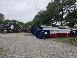 Gentry Dumpster Rentals yard with 15, 20, and 25 yard roll-off dumpsters serving the Denison TX area