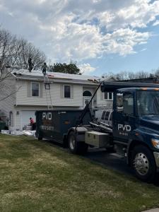 PVD Dumpster Rentals 20-yard roll-off dumpster delivered for a roofing job in Cranston RI