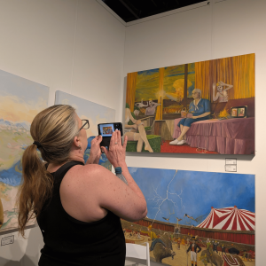 gallery-visitor-photographing-artwork-exhibition.jpg