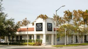 KBF Design Gallery showroom exterior — a white building with a red barrel-tile roof and KBF Design Gallery signage on South Orlando Avenue in Maitland, Florida