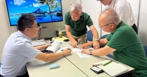 KingPo and TSJ representatives reviewing testing equipment requirements and configurations