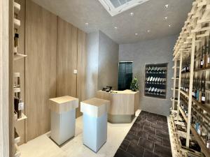 Light and shadow interior concept at MUSASHI JAPAN Omotesando Station Front Store with wooden display fixtures