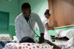 Dr. Rodney with patient