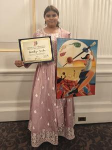 Aaradhya Sunder with her Arts Olympiad certificate and The Artist-Athlete, Washington, D.C., July 2026.