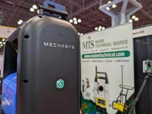 A close-up view of the Mechasys laser layout system featured at the Maine Technical Source exhibition, highlighting modern tech designed for construction accuracy.