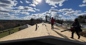 Paramount Roofing NH crew performing roof replacement in New Hampshire